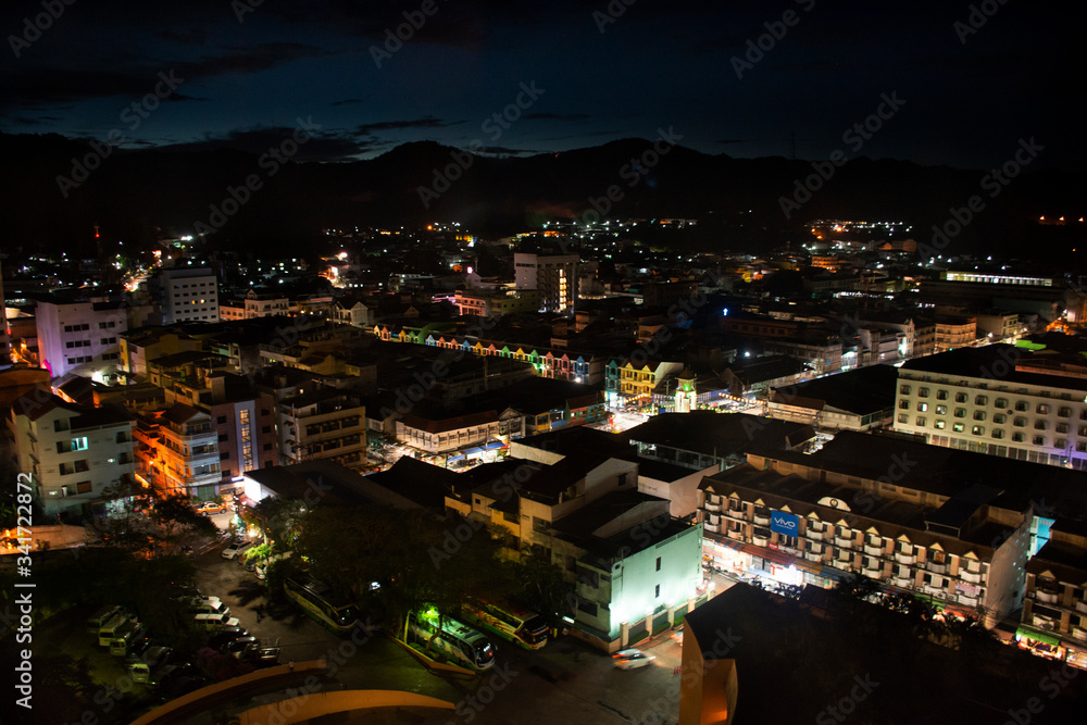 Aerial view landscape and cityscape with traffic road of Betong town in southern thai in night time from top of resort hotel at Betong on August 16, 2019 in Yala, Thailand
