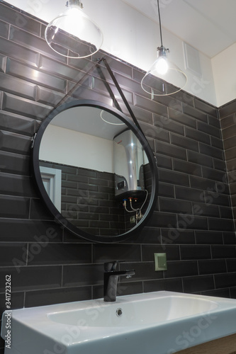 Modern bathroom with shower and wood effect tiling