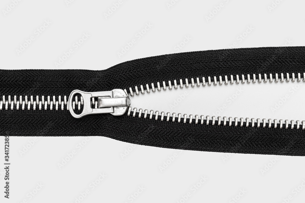 isolated black zipper with metal lock on white background isolated black zipper with metal lock on white background
