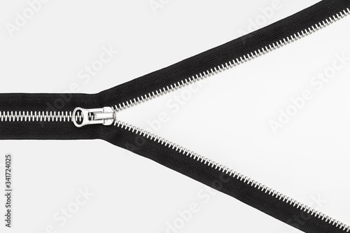 isolated black zipper with metal lock on white background