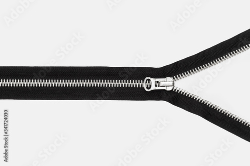 isolated black zipper with metal lock on white background