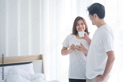 Senior couples wear casual clothes and talking at home.