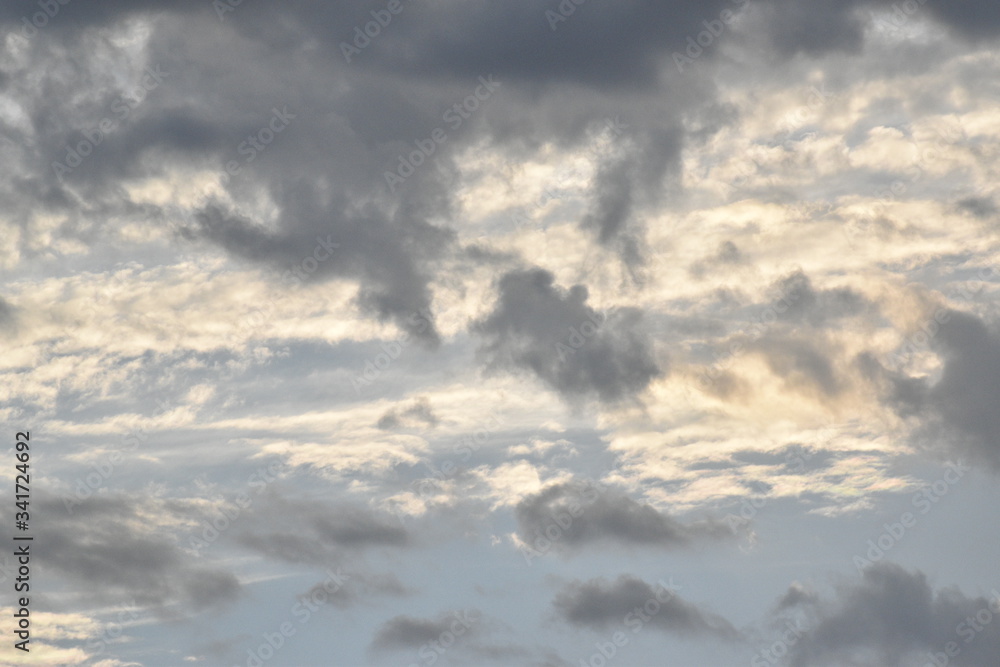 Dramatic sunrise and rainy storm sky with dark cloud.Abstract nature background. Dramatic sunrise and rainy storm sky with dark cloud.Abstract nature background.