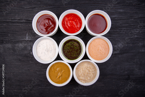 Sauces are collected, served with different dishes, fish, meat and garnish