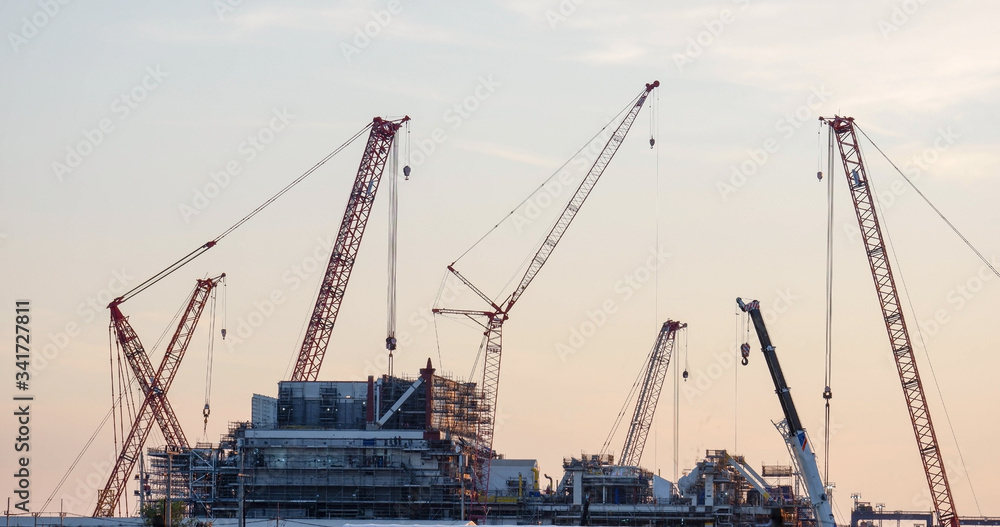 Construction site and sunset, beam, steel structure, build large residential buildings on the construction site