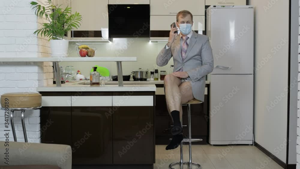 Quarantine. Businessman talking on phone, working at home office. Coronavirus Quarantine. Businessman talking on phone, working at home office. Coronavirus