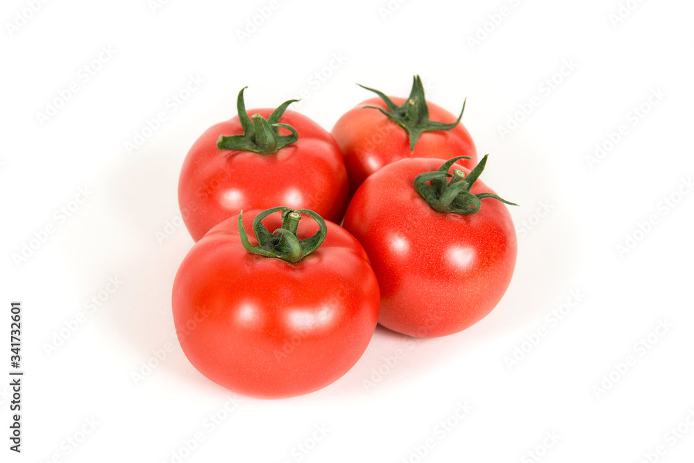 Group of red fresh tomatoes on a white background Group of red fresh tomatoes on a white background