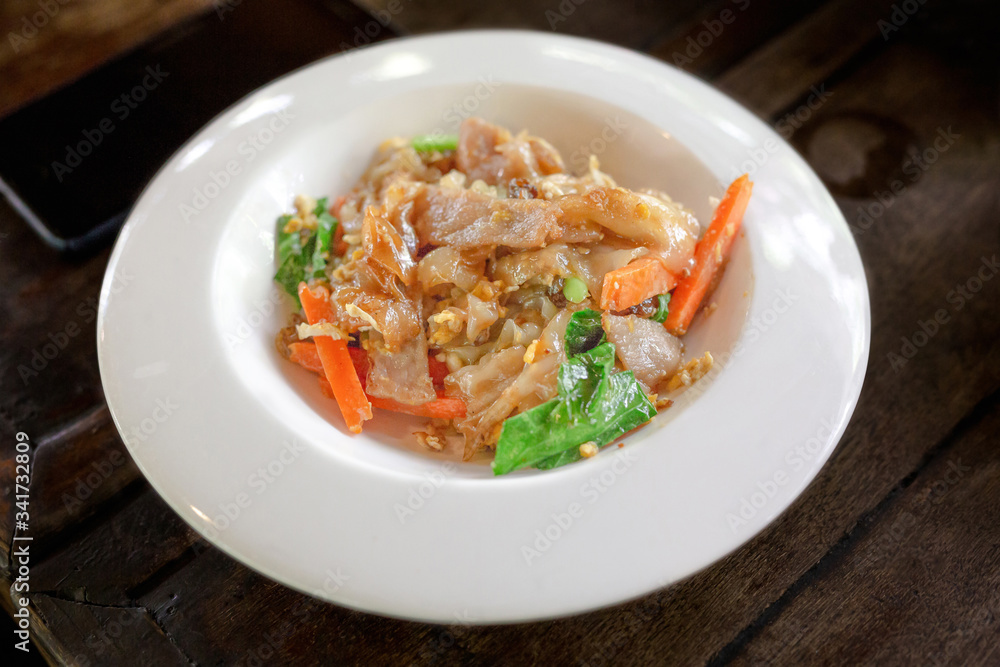 Stir fried pork noodles with black soy sauce Stir fried pork noodles with black soy sauce