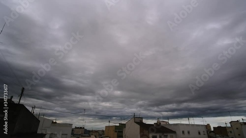 4k timelapse storm clouds over the city