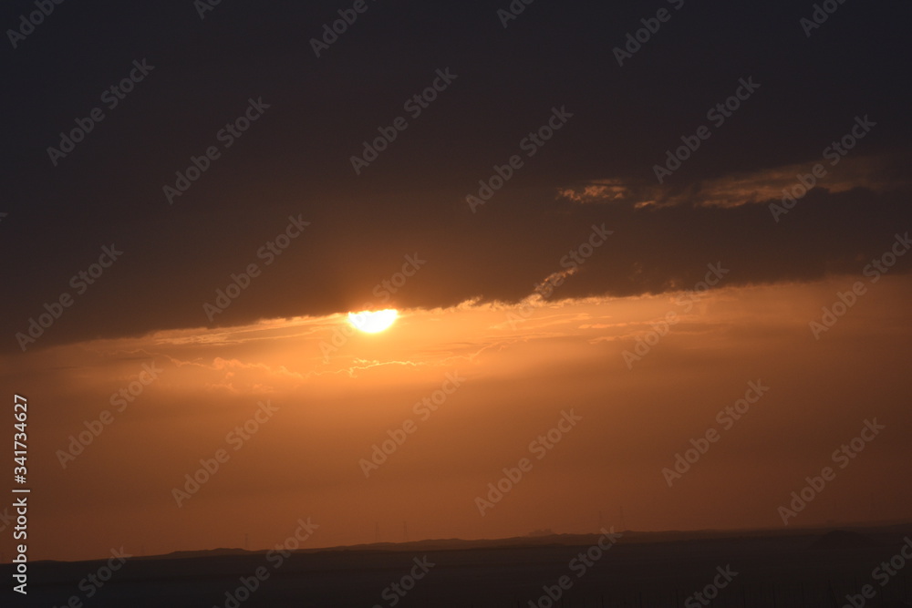 Sunrise in the summer with golden clouds. Sunrise in the summer with golden clouds.