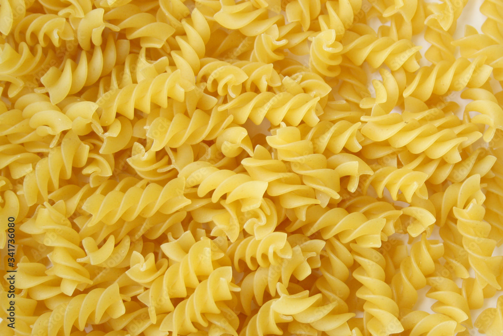 Spiral pasta.Fusilli spaghetti pattern background. Fusilli background.
Spiral pasta.Fusilli spaghetti pattern background. Fusilli background.