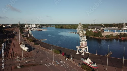 4K Kotka Baltic Sea Finnish Bay lagoon summer morning harbour aerial video, Kotka port and town over calm water channel in Finland-Suomi, northern Europe photo