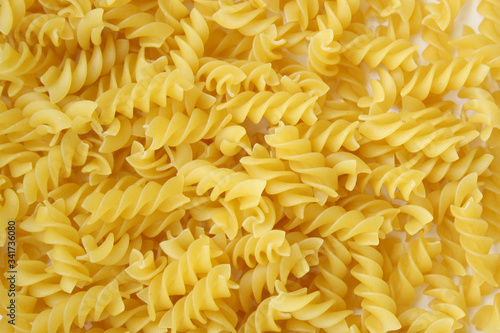 Spiral pasta.Fusilli spaghetti pattern background. Fusilli background.
