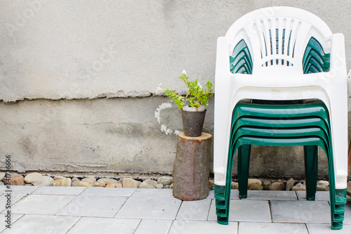 Stack of plastic chairs