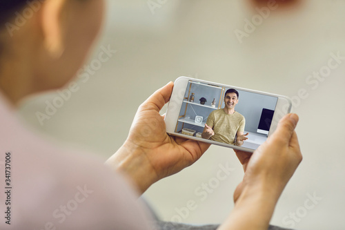 Online video chat with people at home.