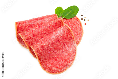 Salami slices isolated on white background.