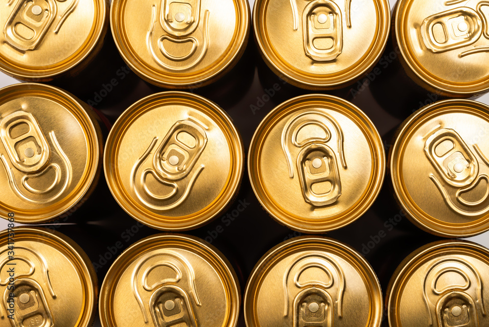Group of golden aluminium cans in a row, cold drink. Group of golden aluminium cans in a row, cold drink.