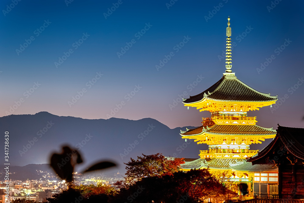 Traveling Through Japan. Pleasing Sunset Over Sanjunoto Pagoda with Kiyomizu-dera Temple in Kyoto City, Japan Traveling Through Japan. Pleasing Sunset Over Sanjunoto Pagoda with Kiyomizu-dera Temple in Kyoto City, Japan