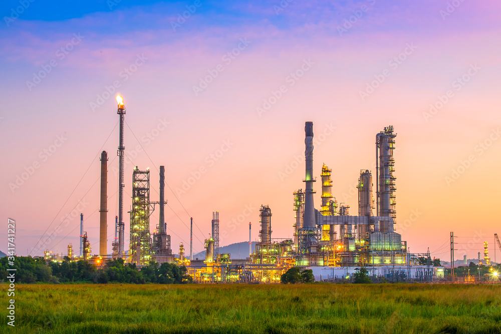 Refinery plant area at twilight sky. oil industry, environment, air pollution, oil refinery, petrochemical plant or petroleum industry concept	