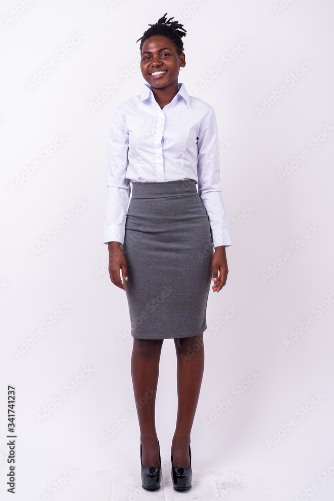 Full body shot of young beautiful African businesswoman Full body shot of young beautiful African businesswoman