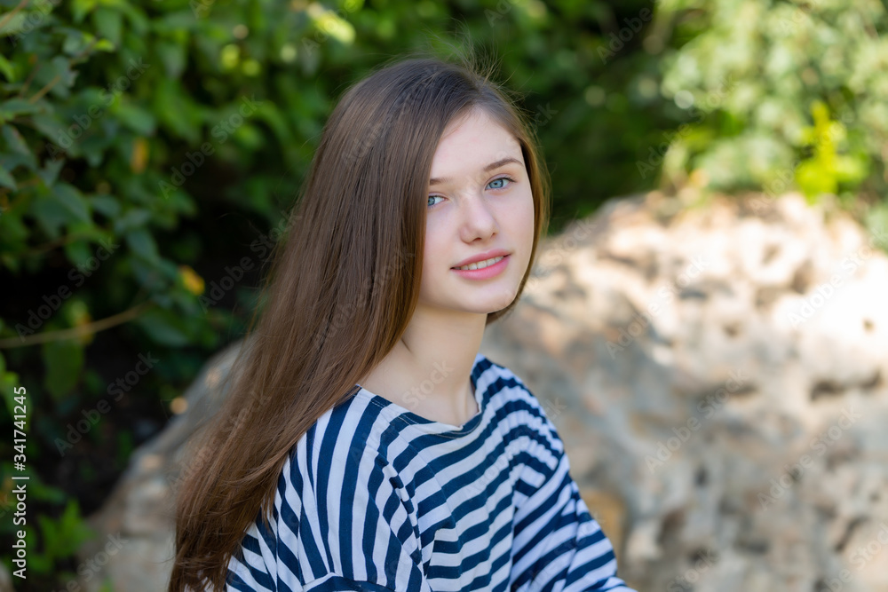 Beautiful teen girl in a marine striped shirt Beautiful teen girl in a marine striped shirt