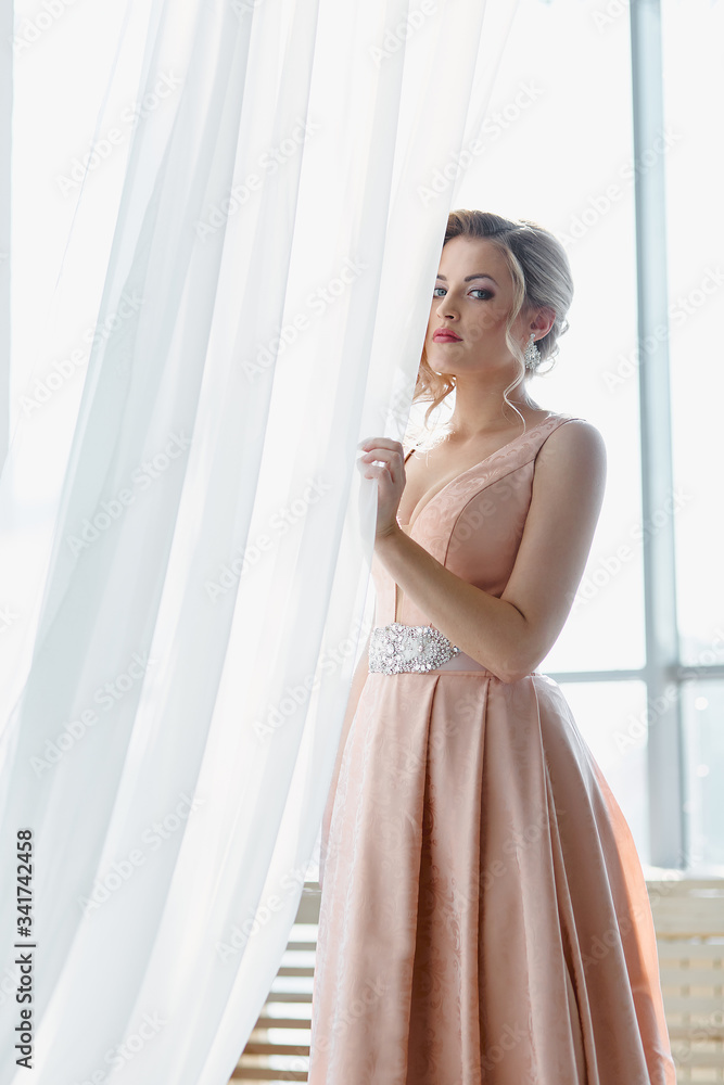 Fashion bride in gorgeous wedding dress. Beautiful model with bridal makeup and hairstyle in marriage dress. Fashion bride in gorgeous wedding dress. Beautiful model with bridal makeup and hairstyle in marriage dress.