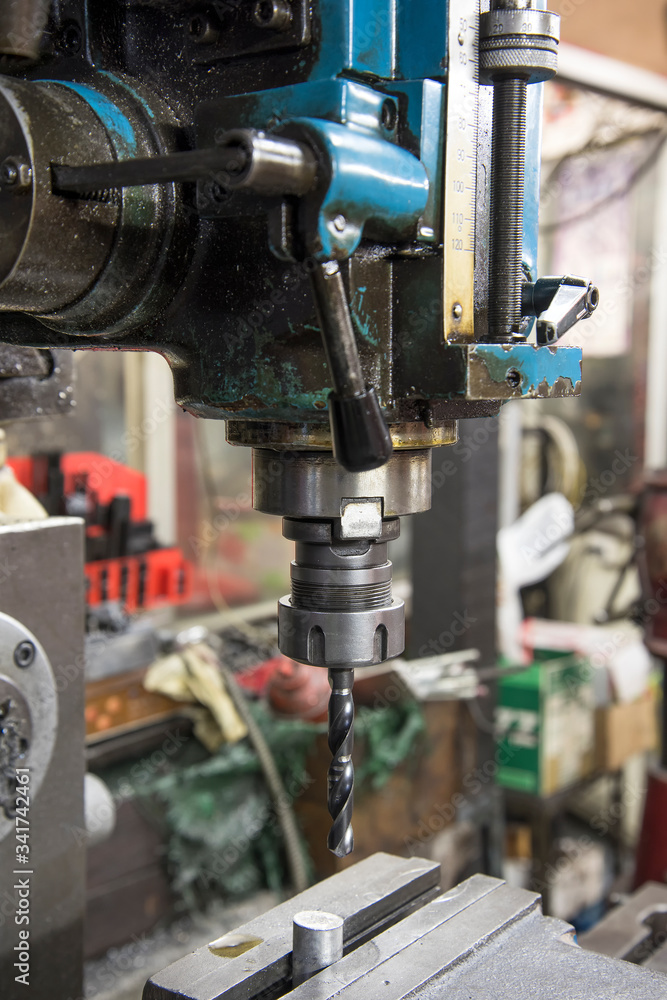 CNC drilling and milling in a workshop CNC drilling and milling in a workshop