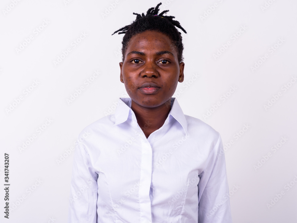 Face of young beautiful African businesswoman looking at camera Face of young beautiful African businesswoman looking at camera