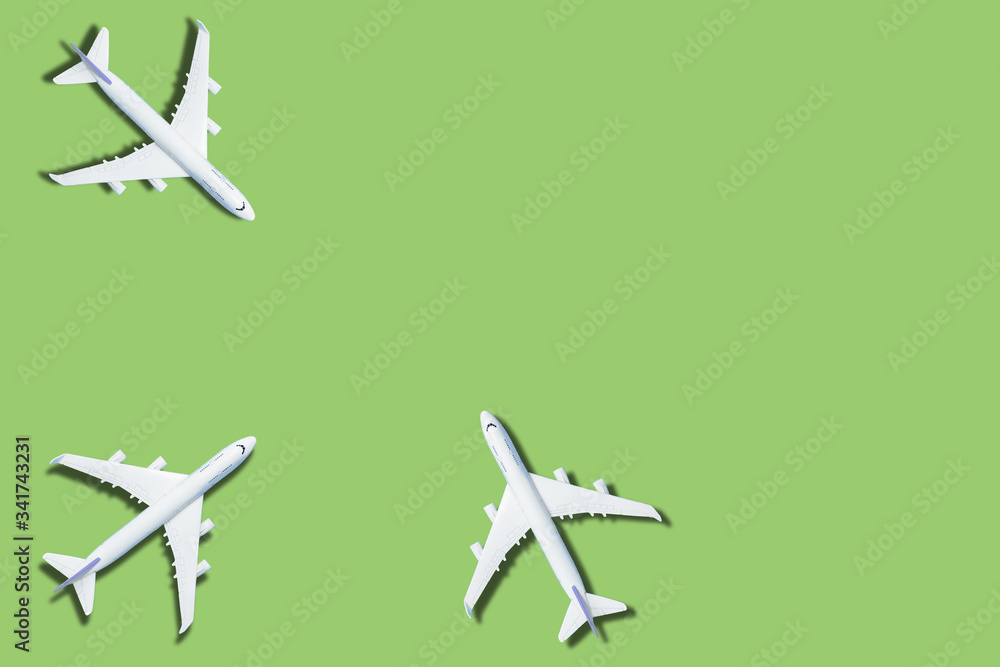 Model plane,airplane on green color background. 3d rendering Model plane,airplane on green color background. 3d rendering