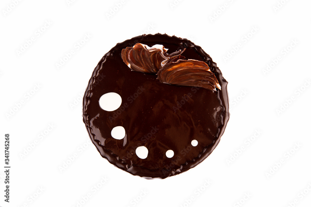 Chocolate cake with chocolate glaze on white background Chocolate cake with chocolate glaze on white background