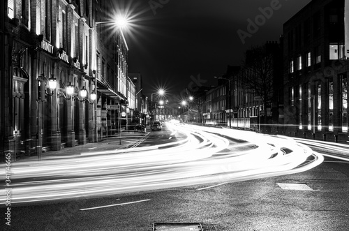 Stunning black and white night shot with light streams in European city - Dublin