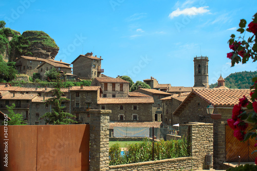 View of a small remote town of medieval type. Located in mountainous terrain on an extinct volcano.