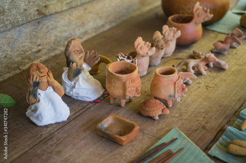 indigenous Mayan figurines depicting traditional animal and people from the Lacandon tribal history
