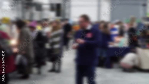 Wallpaper Mural Defocused, blurred image of a crowd of people. Flea market, hangar fair, garage sale. Torontodigital.ca