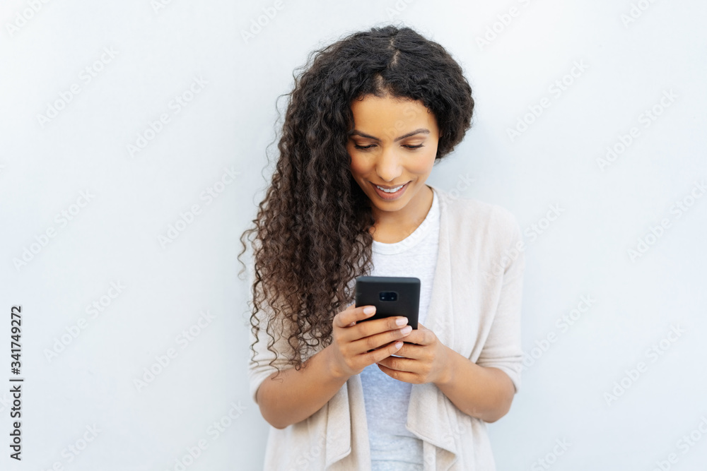 Attractive young black student with long wavy hair Attractive young black student with long wavy hair