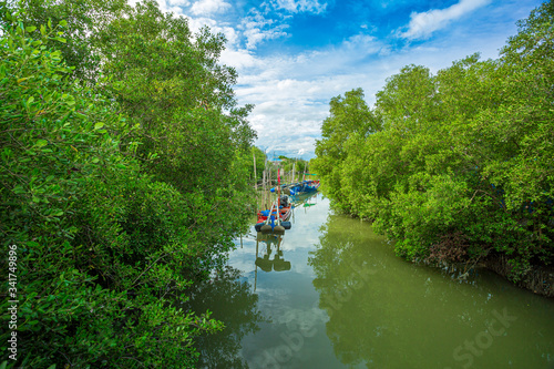 Fishing boat in the mangrove forest community in Chanthaburi Province Which is located in the eastern part of Thailand,Can Gio Mangrove Forest, Vietnam photo