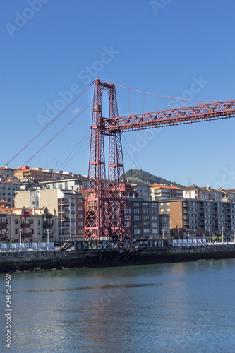 Puente Colgante in the Basque country. Flying ferry on cables. Transport across the river Nervion. Biscay Suspension Bridge. River tram. Traveling in Spain. View of the Portuguese. © Larysa