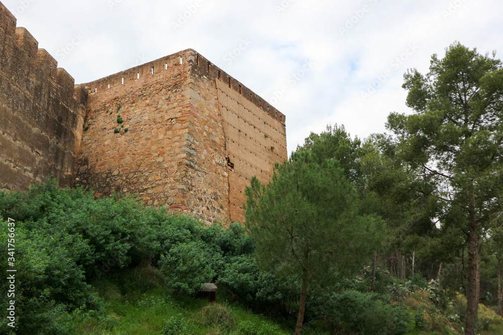 old medieval castle Sagunto tower in green forest