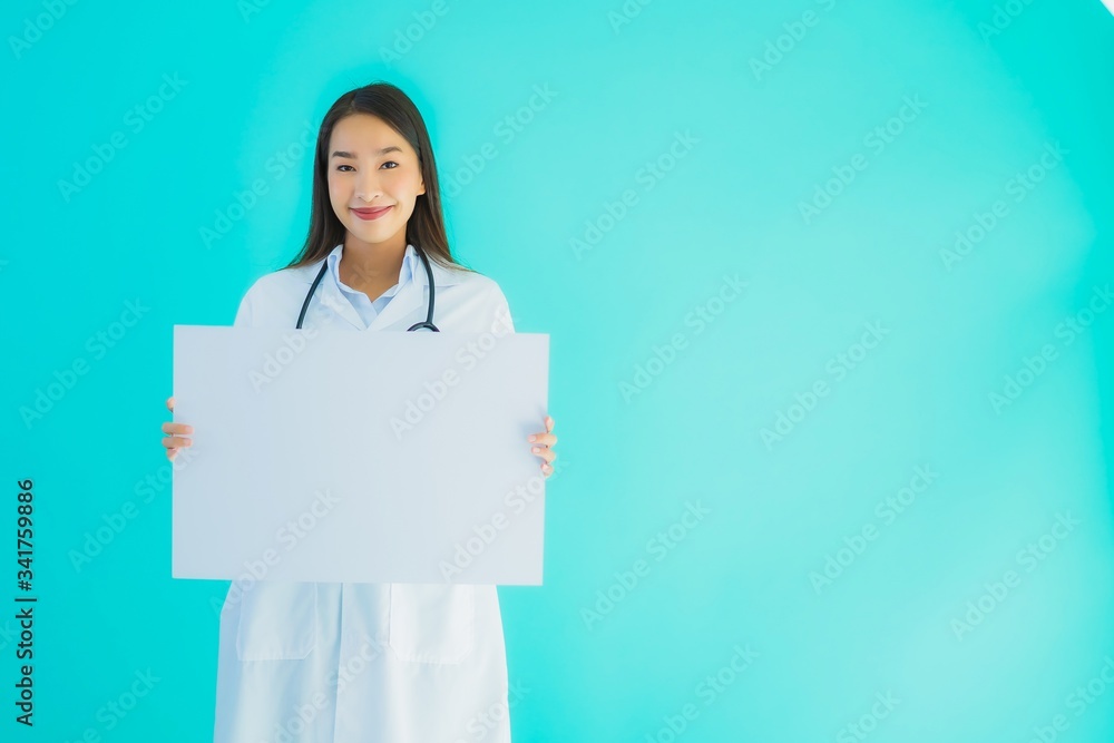 Portrait beautiful young asian doctor woman with empty card board Portrait beautiful young asian doctor woman with empty card board