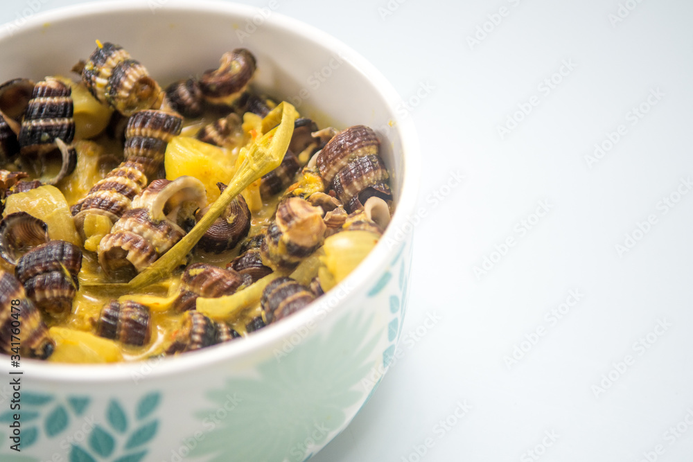 malaysian traditional cooking recipe. Malay traditional dish Sea Snails in coconut cream or ' Siput Sedut Masak Lemak '
malaysian traditional cooking recipe. Malay traditional dish Sea Snails in coconut cream or ' Siput Sedut Masak Lemak '