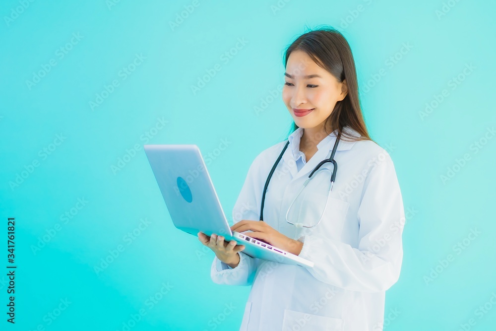 Portrait beautiful young asian doctor woman with laptop Portrait beautiful young asian doctor woman with laptop