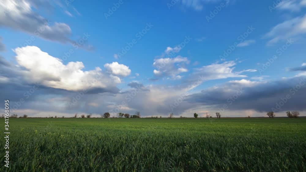timelapse green field / clouds running across the sky timelapse green field / clouds running across the sky