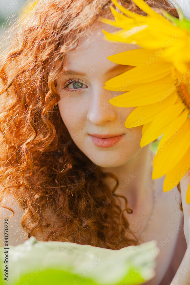 Redhair girl in sunflowers Redhair girl in sunflowers