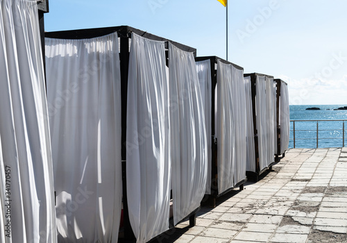 Canvas Print The Beach arbors closed with a white cloth, Crimea