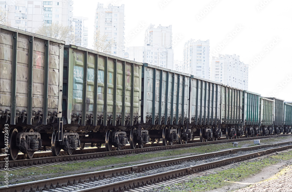 Obraz premium visual effect, residential buildings in freight train cars. freight railway transport