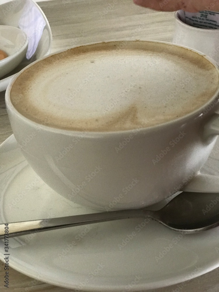 cup of coffee with milk cup of coffee with milk