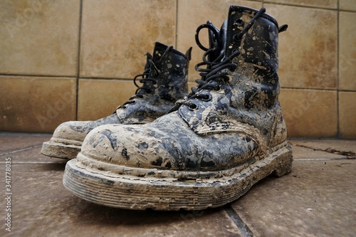 Pair of heavy dirty muddy boots