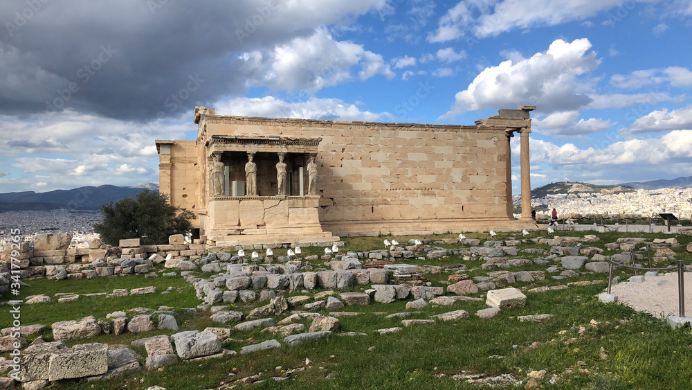 Erechtheion temple in Athens. Ruins of the Temple of Erechtheion and Temple of Athena at the Acropolis hill in Greece.