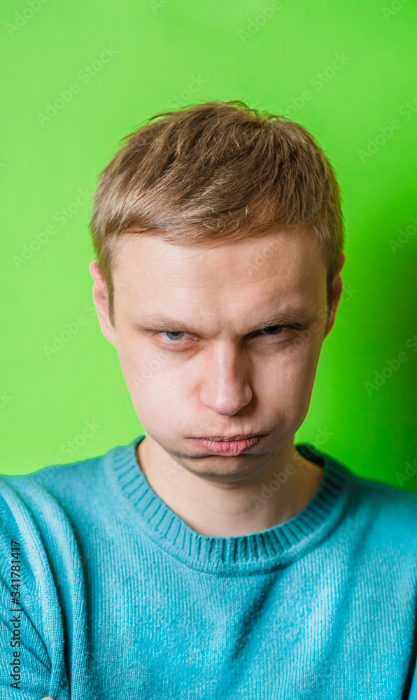 young man inflate his cheeks young man inflate his cheeks