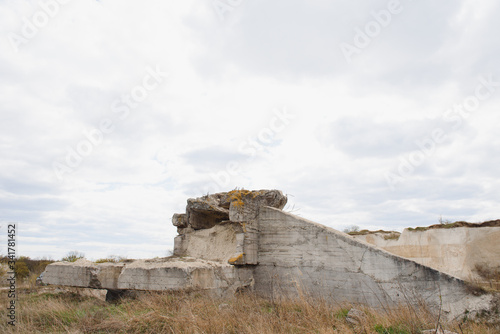 the ruins of german bunker in the beach of Normandy, France
